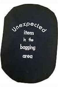 A black stoma bag with the words written 'Unexpected item in the bagging area'